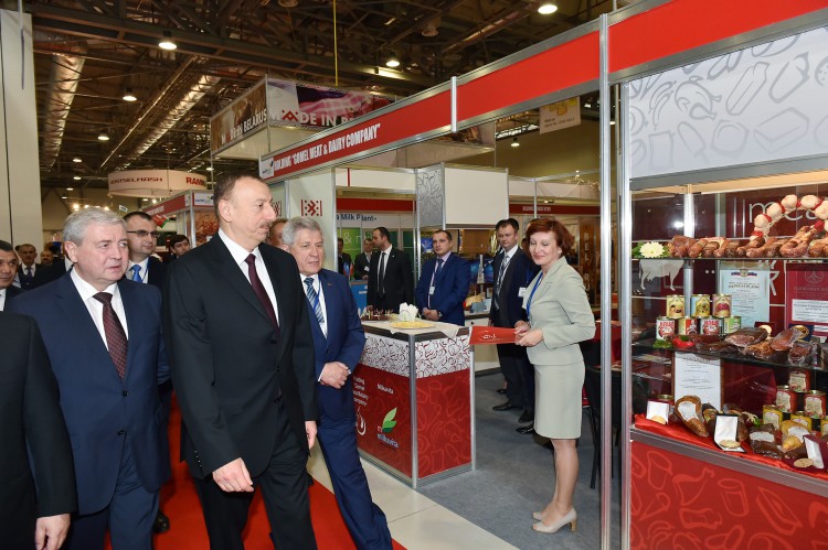 Azerbaijani president observes two exhibitions in Baku (PHOTO)