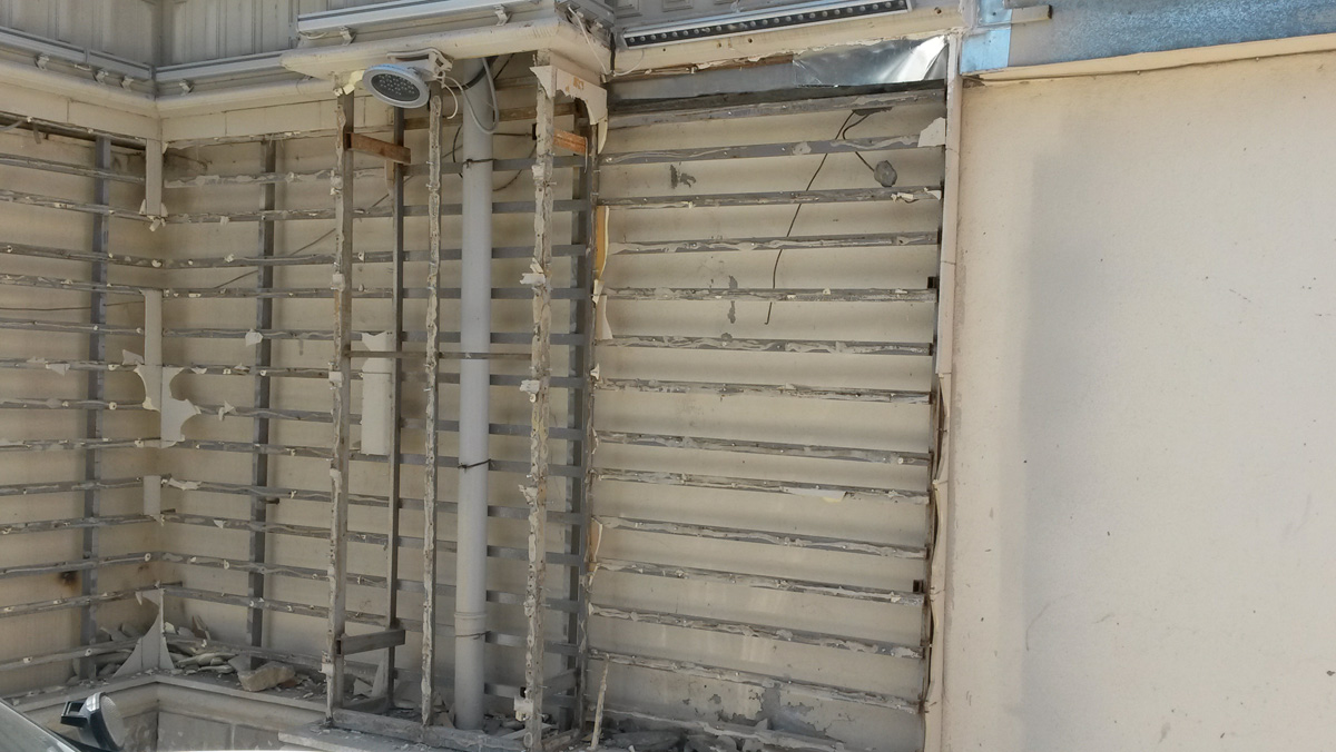 Начались работы по демонтажу облицовки зданий в Бинагадинском районе Баку (ФОТО)