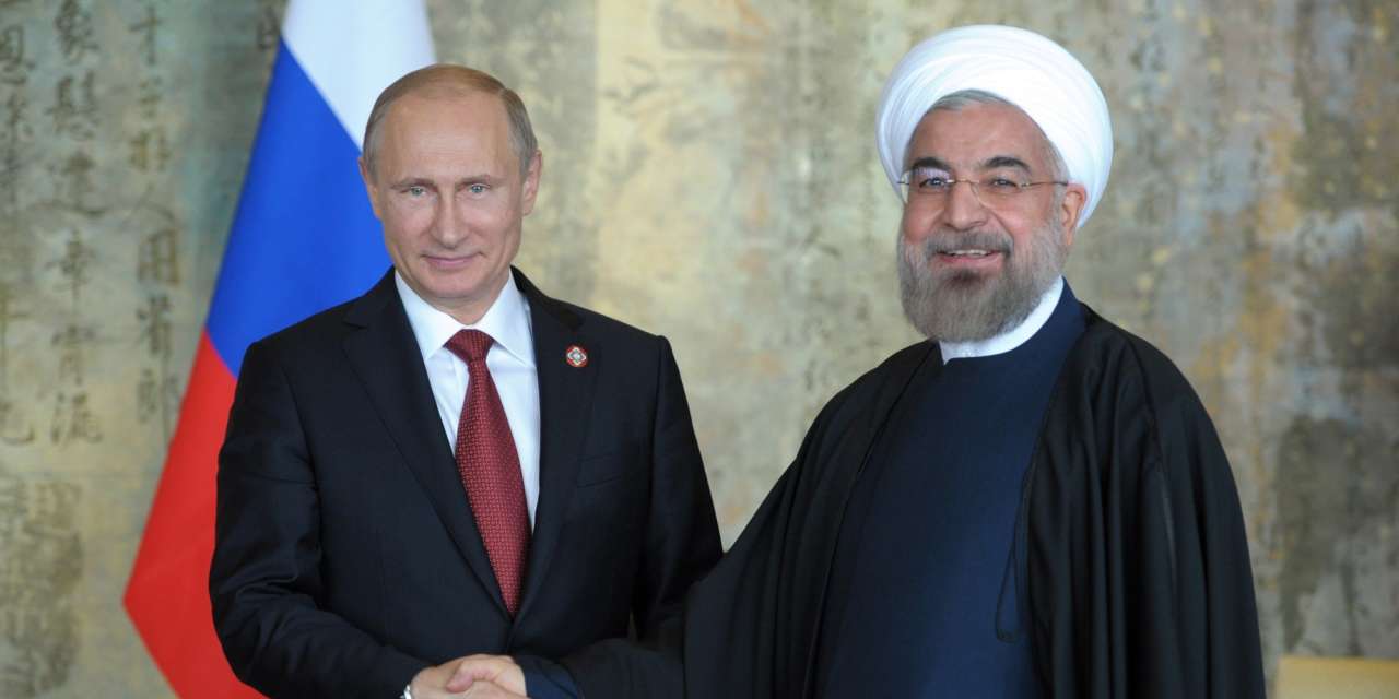 Russian, Iranian presidents agree to work closely on Syria