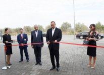 Azerbaijani president, his spouse attend opening of school complex and Golf Club