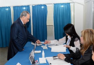 Head of Azerbaijani Presidential Administration votes at parliamentary election