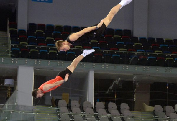 Российские гимнасты завоевали "золото" в синхронных выступлениях на Кубке мира по прыжкам на батуте в Баку