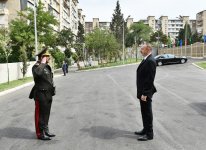 President Aliyev views residential building for servicemen