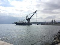 Как очищают Бакинскую бухту (ФОТО, ВИДЕО)