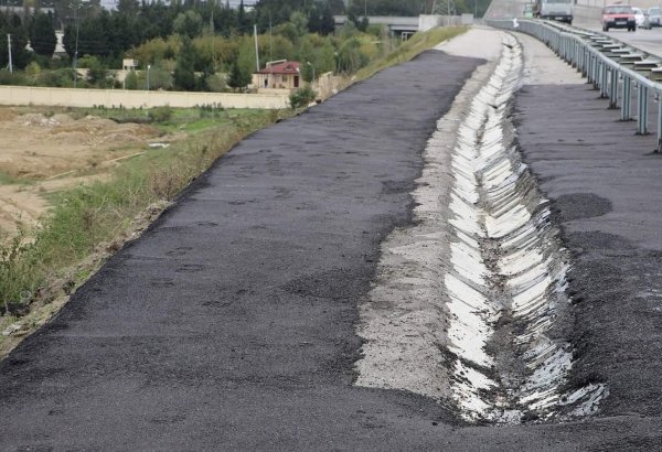 Dairəvi yolda yaranmış çatlar bərpa olunub (FOTO)