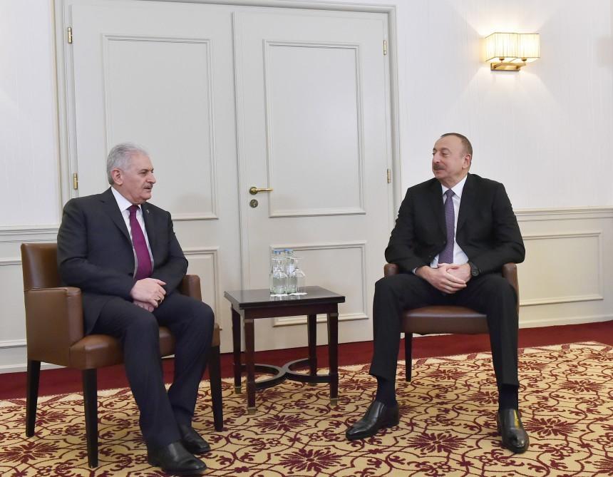 Ilham Aliyev meets with Turkish PM in Munich (UPDATE)