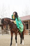 Сильнейшая паратхэквондистка мира Айнур Мамедова в образе символа Новруза на коне (ФОТО)