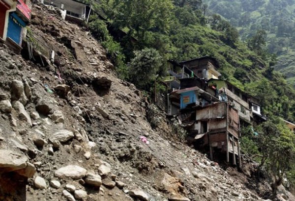 Landslide near Malaysian capital kills two, dozens missing