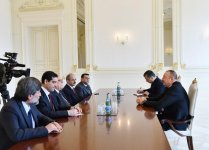 Ilham Aliyev meets delegation led by Turkish minister (PHOTO)