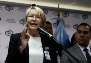 Venezuela's chief prosecutor says government harassing her family