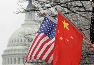 China's top diplomat calls for U.S. restraint on trade, Iran