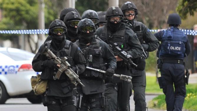 Australian police raid three properties linked to former NAB supplier