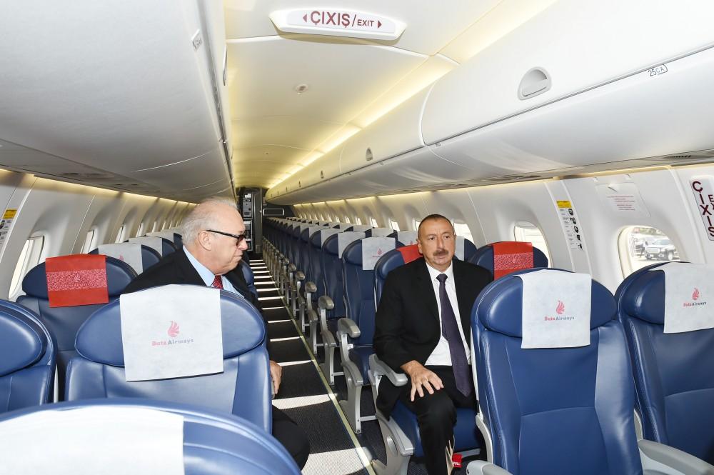 Prezident İlham Əliyev "Buta Airways" aviaşirkətinin Bakıya gətirilən ilk "Embraer 190" təyyarəsi ilə tanış olub (FOTO)