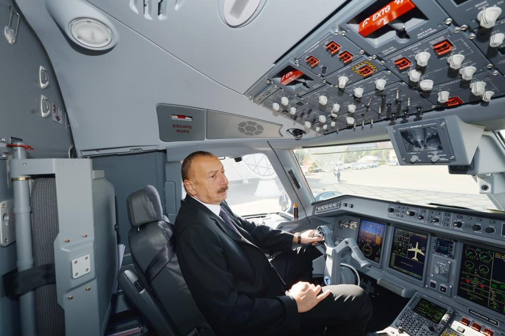 Ilham Aliyev views Embraer 190 aircraft delivered to Baku by Buta Airways (PHOTO)