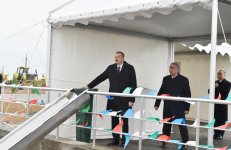 President Ilham Aliyev takes part in laying of road section on Baku - Russia border (PHOTO)