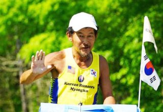 Korean marathon runner Myongku Kang arrives in Azerbaijan