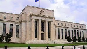 Fed keeps rates near zero, says hike likely 'soon'