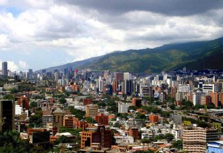 Venezuela to let companies raise capital in dollars as Maduro liberalizes economy
