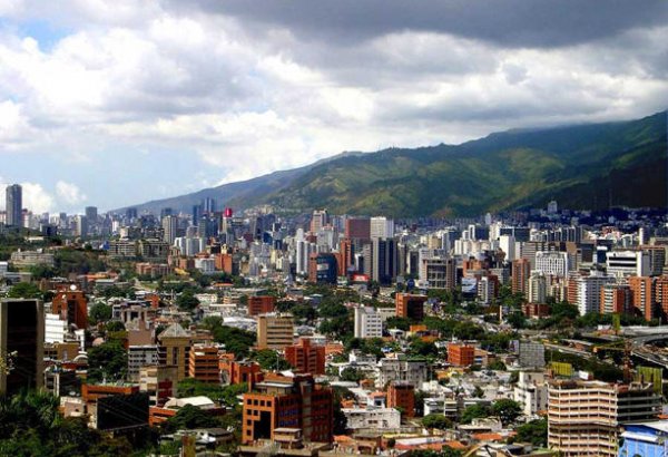 Venezuela to let companies raise capital in dollars as Maduro liberalizes economy