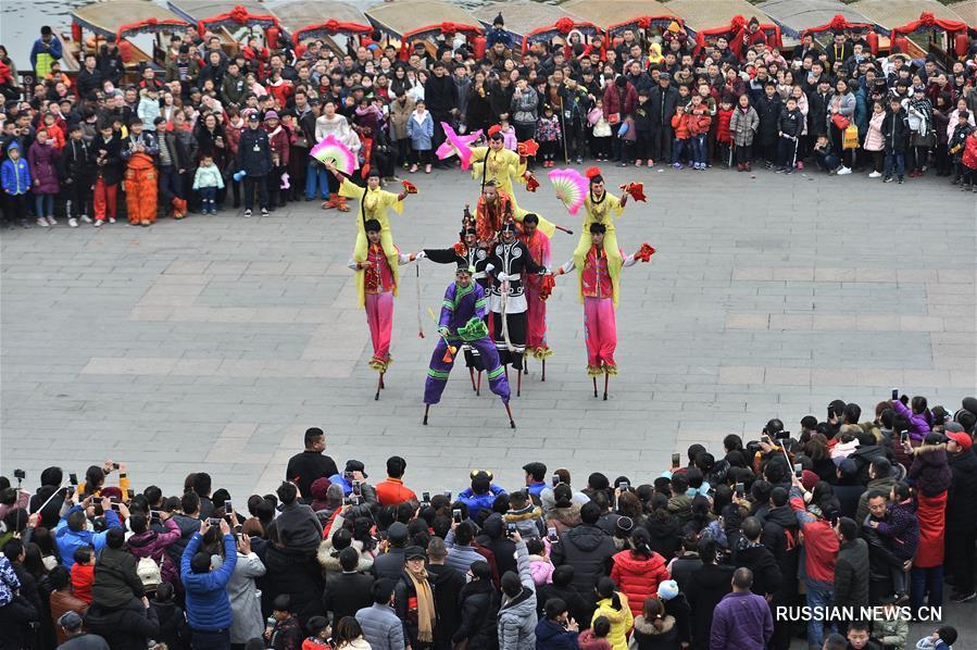Поток туристов в Китае в Праздник Весны достиг 386 млн. человек (ФОТО)