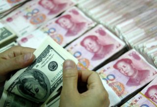 Dollar, yuan jump after U.S. makes trade concessions to China