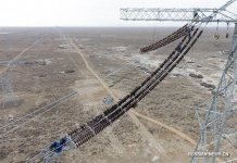 Завершено строительство синьцзянского участка 1100-киловольтной ЛЭП Чанцзи-Сюаньчэн (ФОТО)