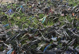 В крупных городах Китая образовались стихийные кладбища велосипедов