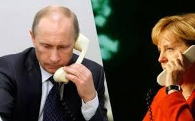 Putin və Merkel Ukraynadan tranzitlə keçən Rusiya qazını müzakirə ediblər