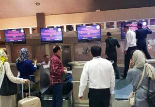 Hackers post protest messages on Iranian airport monitors