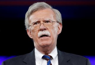 U.S. adviser Bolton to urge tougher UK stance on Iran and China