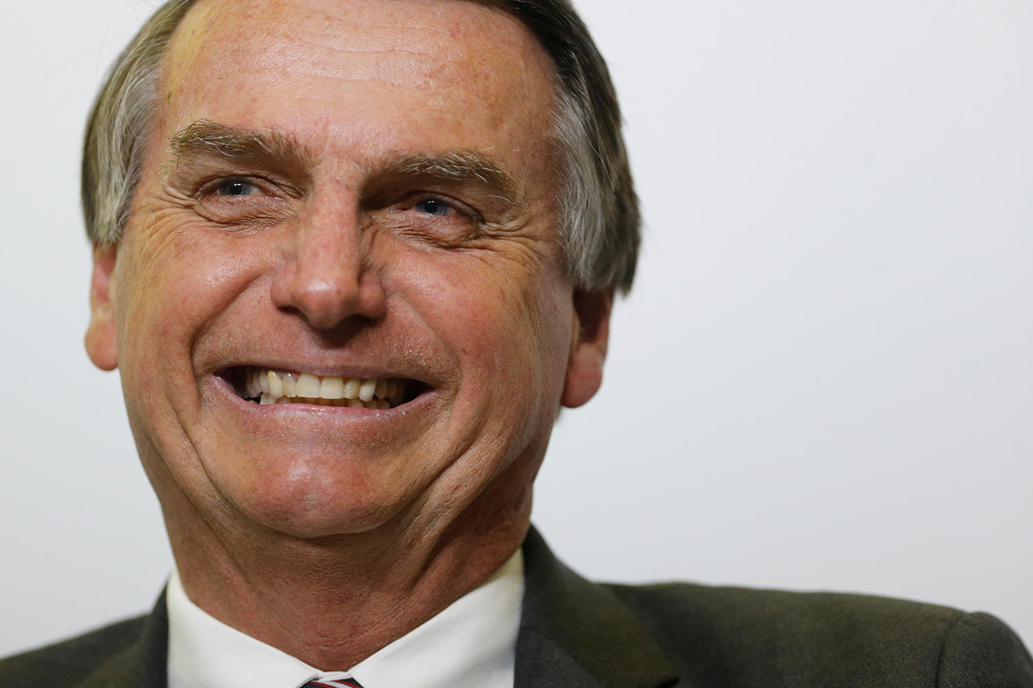 Brazil presidential candidate Bolsonaro keeps lead, leftist gains: poll
