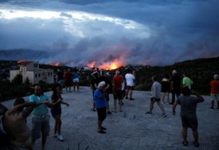 Greece seeks survivors and answers after deadly wildfire