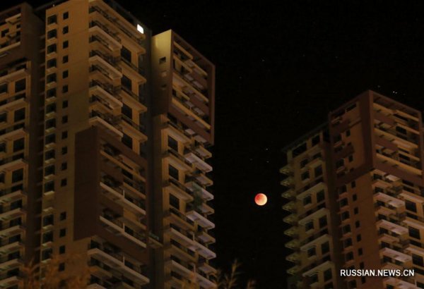 Самое продолжительное полное лунное затмение 21 века: вид с территории Китая (ФОТО)