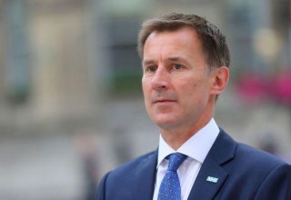 UK's Hunt hikes energy windfall tax, extends it to power firms