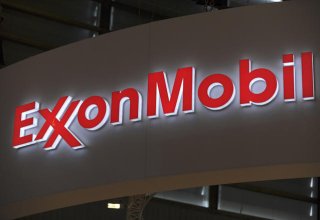 Weak oil prices hit Exxon's third-quarter earnings