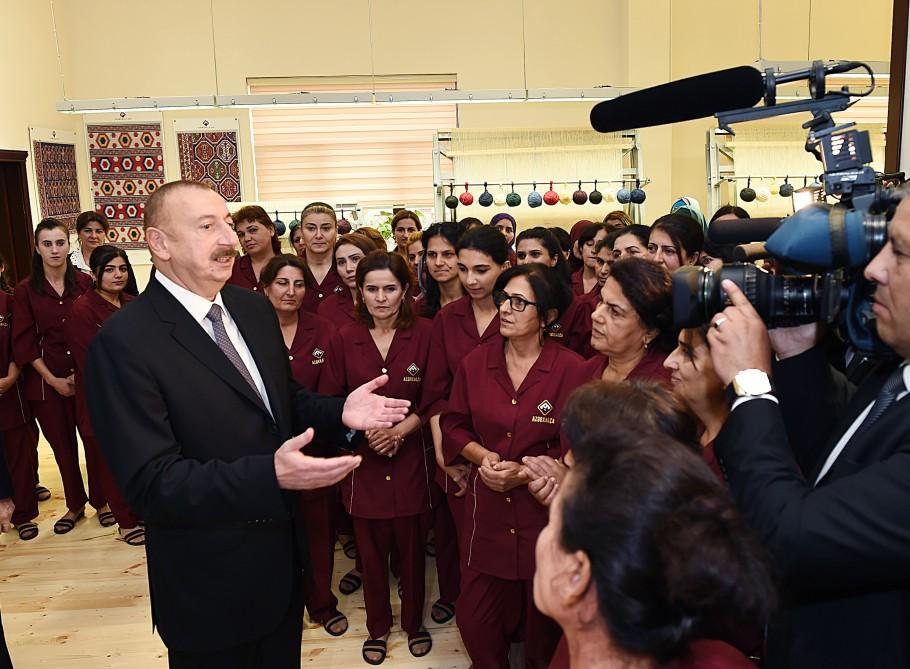 Azerbaijani president, first lady attend opening of Lankaran branch of Azerkhalcha (PHOTO)