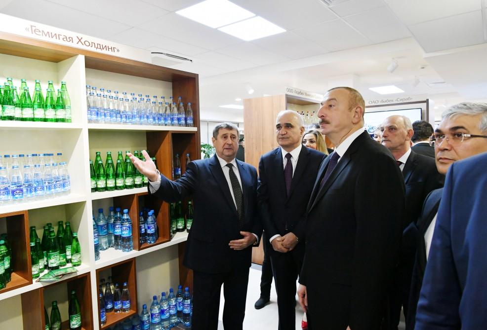 President Ilham Aliyev observes Azerbaijan’s trading house in Minsk (PHOTO)