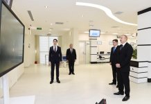 Azerbaijani president inaugurates new residence of real estate services (PHOTO)