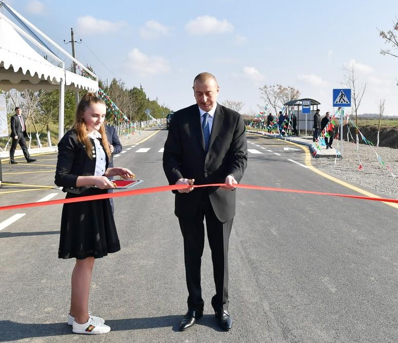 President Ilham Aliyev attends opening of highway in Beylagan district
