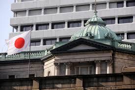 Bank of Japan gives first timeframe for super-low rates, says will remain another year