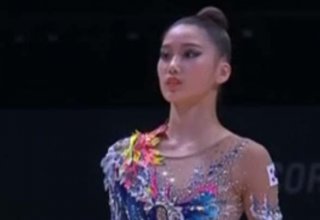 Müslüm Maqomayevin mahnısının sədaları altında çıxış edən koreyalı gimnast bakılıları heyrətləndirdi (VİDEO)