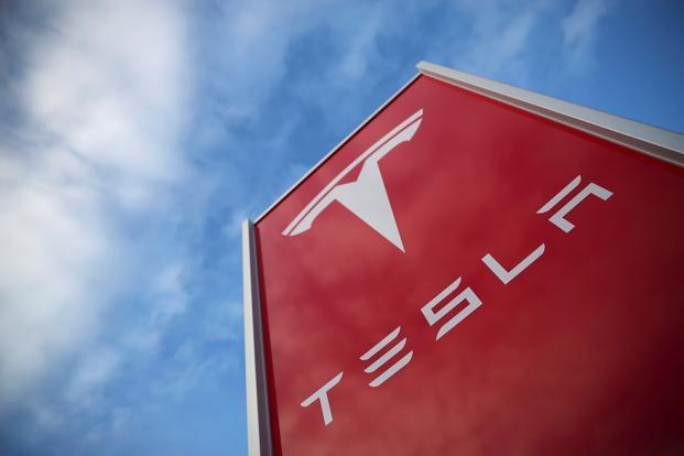 Tesla to raise $5 billion through share offering