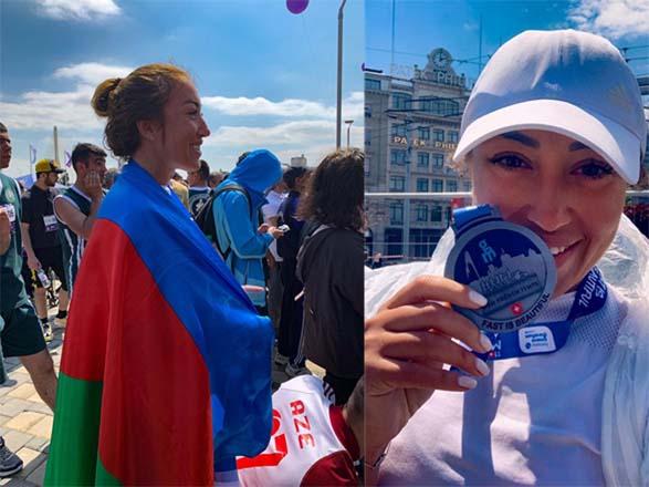 Впервые азербайджанка пробежала по берегу самого большого водоема Альп и Женевы (ФОТО)