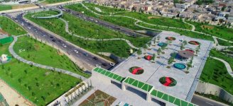 Azerbaijani president, first lady attend opening of garden and Central Park in Baku (PHOTO)