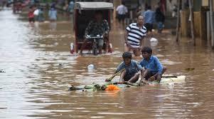 Millions stranded in India as early monsoon downpours bring flood havoc