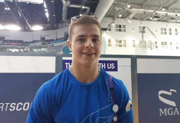 Athlete from Belarus talks on Azerbaijani National Gymnastics Arena during EYOF Baku 2019
