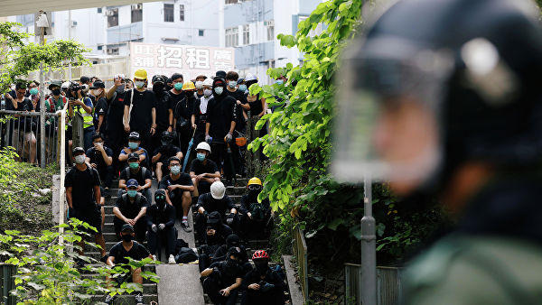 Hong Kong police fire tear gas as thousands protest security law