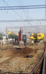 На железных дорогах Азербайджана продолжается установка новых "стрелок" (ФОТО)