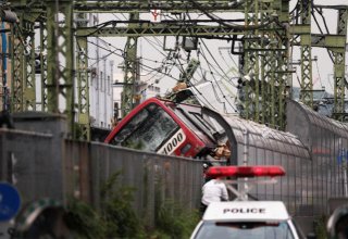 At least 30 injured after collision of train and truck in Japan's Yokohama
