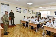 Президент Ильхам Алиев и Первая леди Мехрибан Алиева приняли участие в открытии нового учебного комплекса полной средней школы номер 300 в Бинагадинском районе Баку (версия 2)